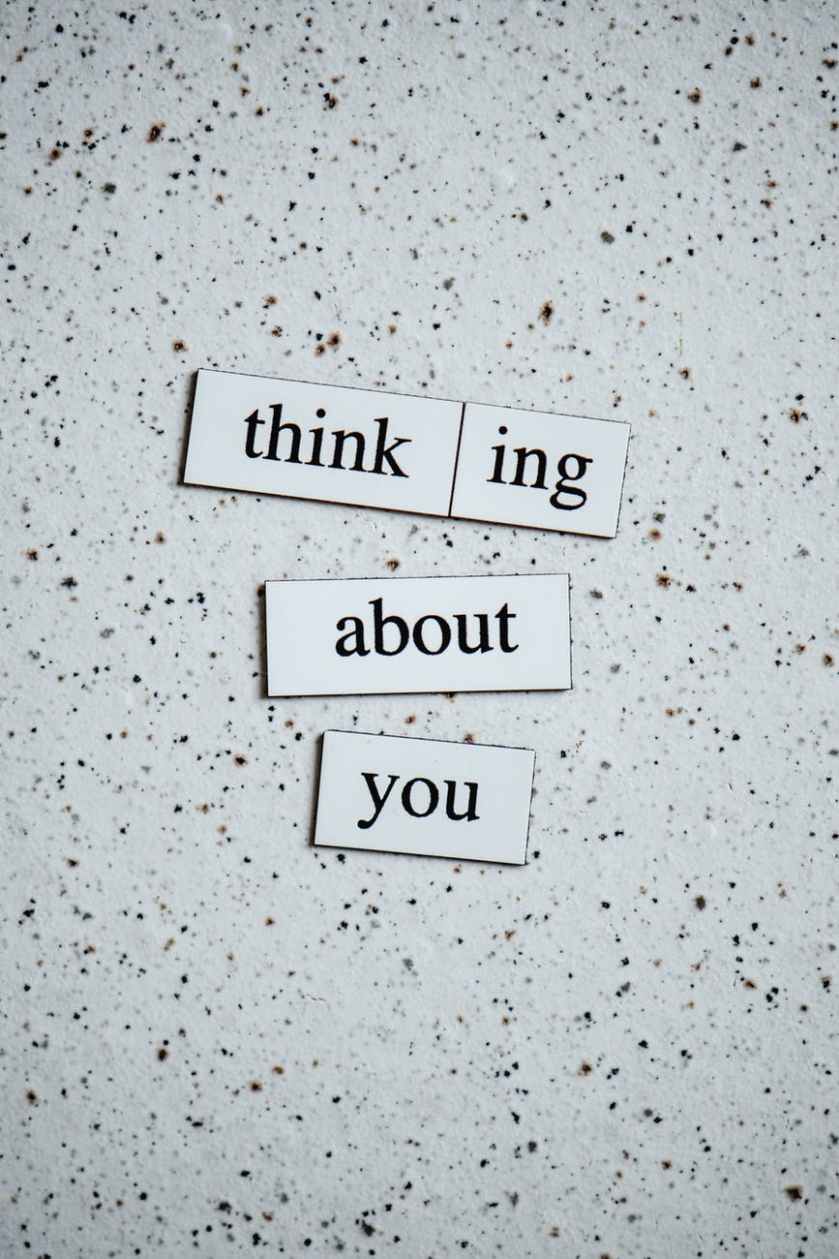 text cutouts on a dotted background